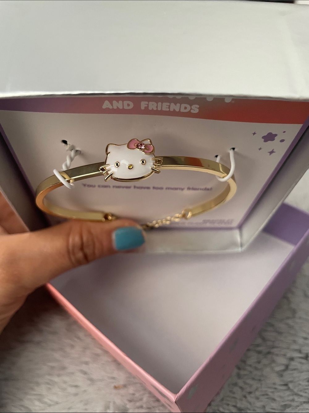 Hello Kitty Gold and White Enamel Bracelet with Pink Bow Accent